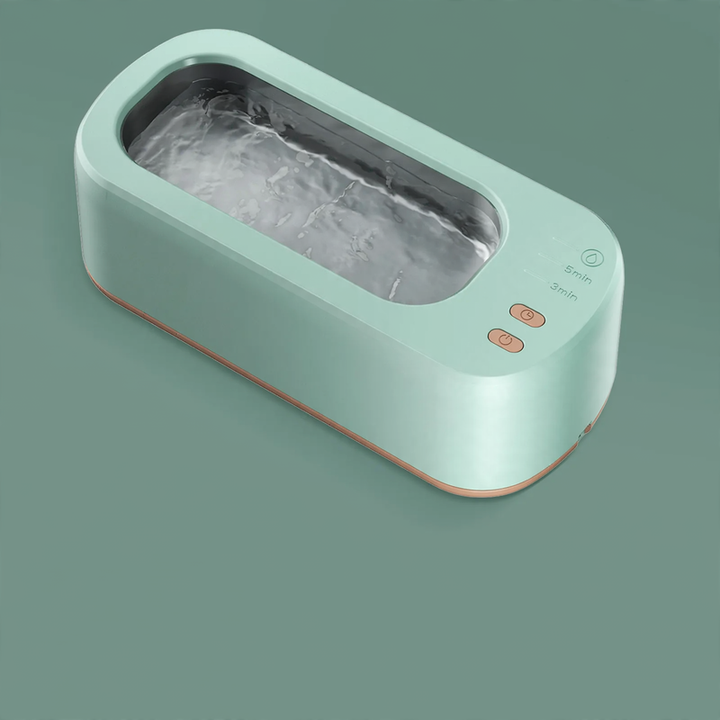 Double chamber ultrasonic cleaning device