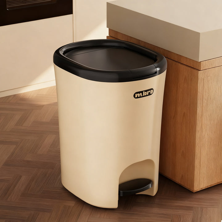 Plastic trash can with foot pedal and lid