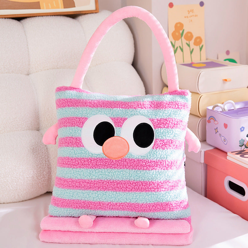 Cuddle cushion and blanket 2-in-1, striped pattern