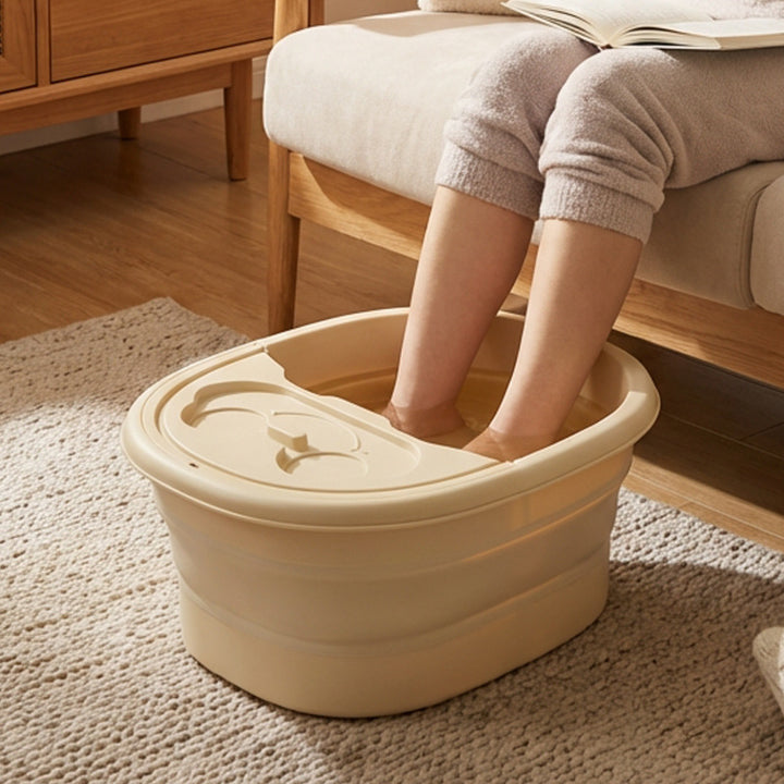 Foldable foot bath with massage function