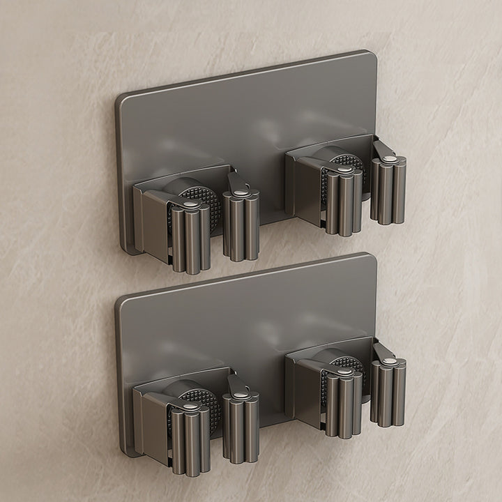 Stainless steel holder for mop and broom