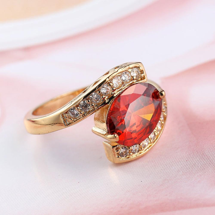 Geometric Gold Ring with Red Center Jewel | Stornfield