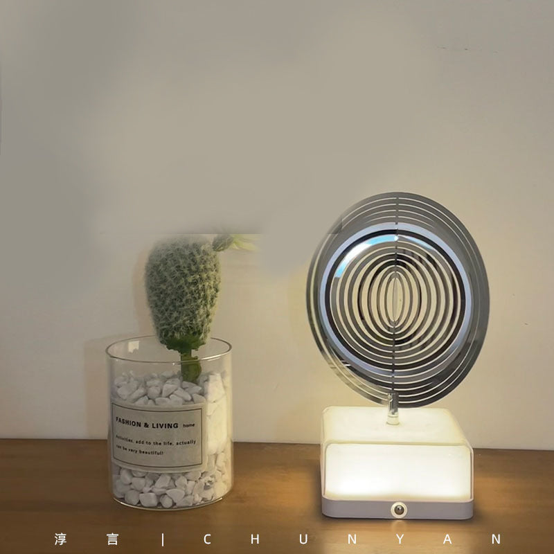 Rotating ambient light made of metal | Stornfield