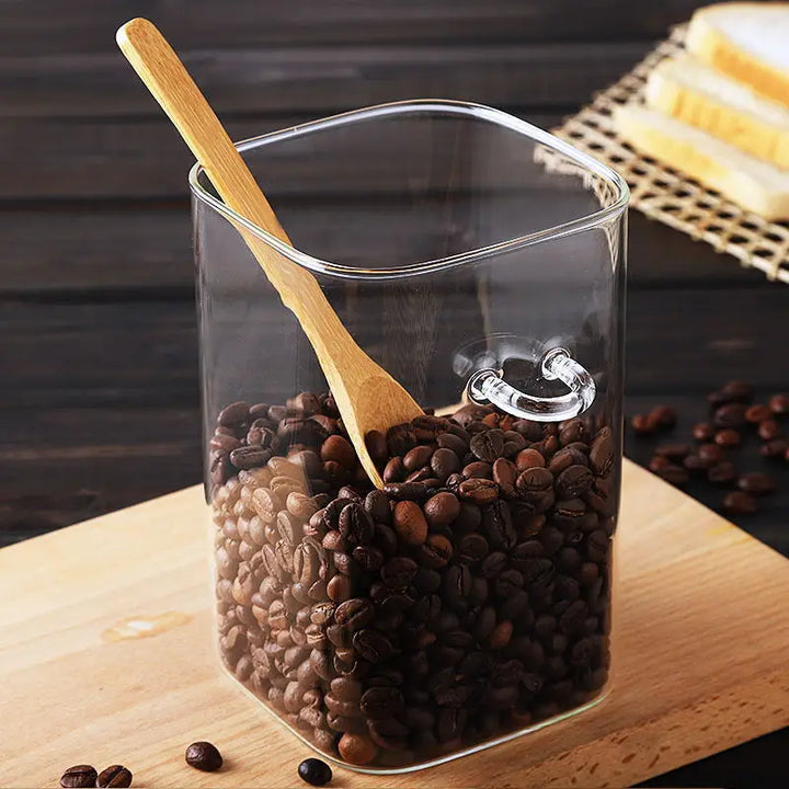 Square glass storage jar with wooden spoon and lid | Stornfield